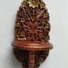 Wooden carved wall shelf